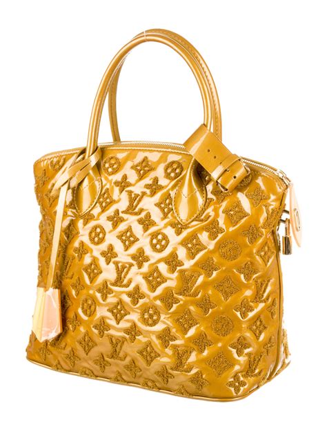 louis vuitton mezzo bag|Louis Vuitton lockit bag.